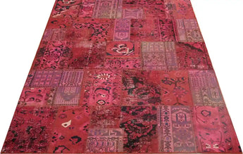 Handwoven modern patchwork rug by Heriz, 300x200 cm, featuring colorful geometric patterns on a soft textile background.