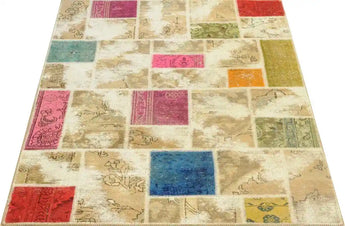 Handwoven modern Heriz patchwork rug, 203x138 cm, featuring colorful geometric patterns and intricate craftsmanship.