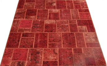 Modern handwoven Heriz patchwork rug, 300x200 cm, featuring vibrant geometric patterns and rich textures.