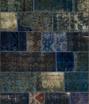 Handwoven modern Heriz patchwork rug, 237x173 cm, featuring vibrant geometric patterns and intricate craftsmanship.