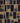 Handknotted modern Heriz patchwork rug, 240x170 cm, featuring vibrant geometric patterns and rich textures.
