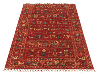 Handwoven Heriz Oriental Rug Rubin 142x100 cm with intricate patterns, showcasing traditional craftsmanship and rich colors.