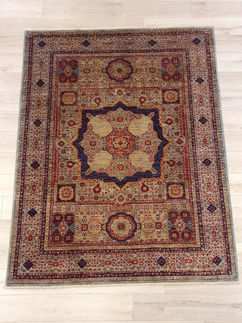 Handwoven Heriz Mamlouk rug, 235x174 cm, featuring intricate oriental design and vibrant colors.